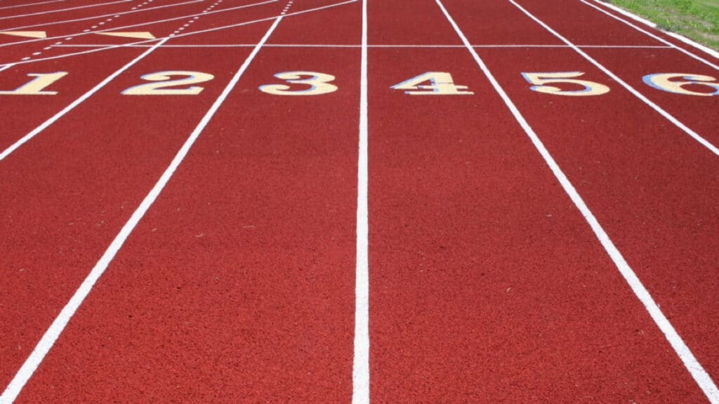 Running tracks symbolising our coaching philosophy