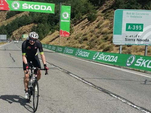 Cyclist riding up to Sierra Nevada in Spain
