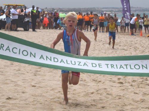 Young triathlete winning race in Chiclana